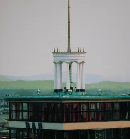 Oseba se vzpenja po elegantnem betonskem stopnišču v sodobni notranjosti, ki prikazuje kakovostne betonske stopnice.